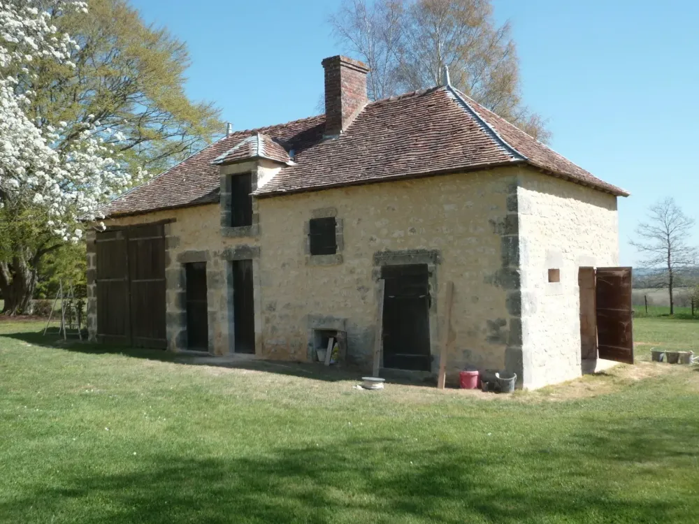 Couverture et charpente de bâtiment ancien près de Orne